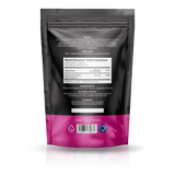A black stand-up pouch of a dietary supplement with a bright magenta-pink band at the bottom, shown on a clean white background with a soft reflection underneath.