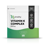A stand-up pouch of Nutrality Vitamin K Complex 2200 Ωg food supplement, featuring a white and green color scheme with a black vertical banner on the right side.