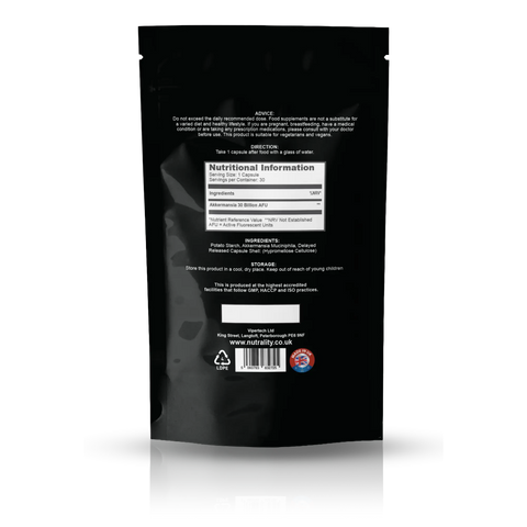 The back of a black resealable stand-up pouch package, showing printed text, a nutrition facts panel, ingredients list, and a barcode on a white background with a soft reflection below.