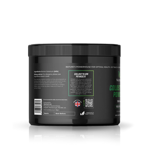 A black plastic tub of Nutrality Bovine Colostrum Powder, showing the back label with ingredients, QR code, and branding, on a white background with a soft reflection.