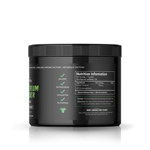 A black plastic tub of Colostrum powder supplement with a black lid, featuring green and white text and a green cow logo on a white background.
