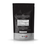 The back of a black stand-up pouch with a gray lower section, showing product details, a nutrition label, and a barcode on a white background.