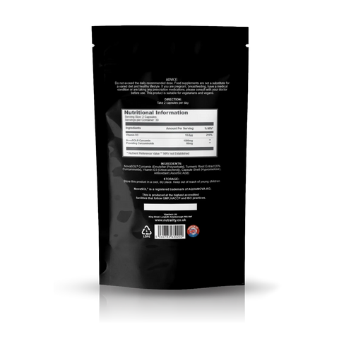 The back of a black stand-up pouch package, showing printed text, a Nutrition Facts panel, ingredients list, and barcode on a white background with a soft reflection below.